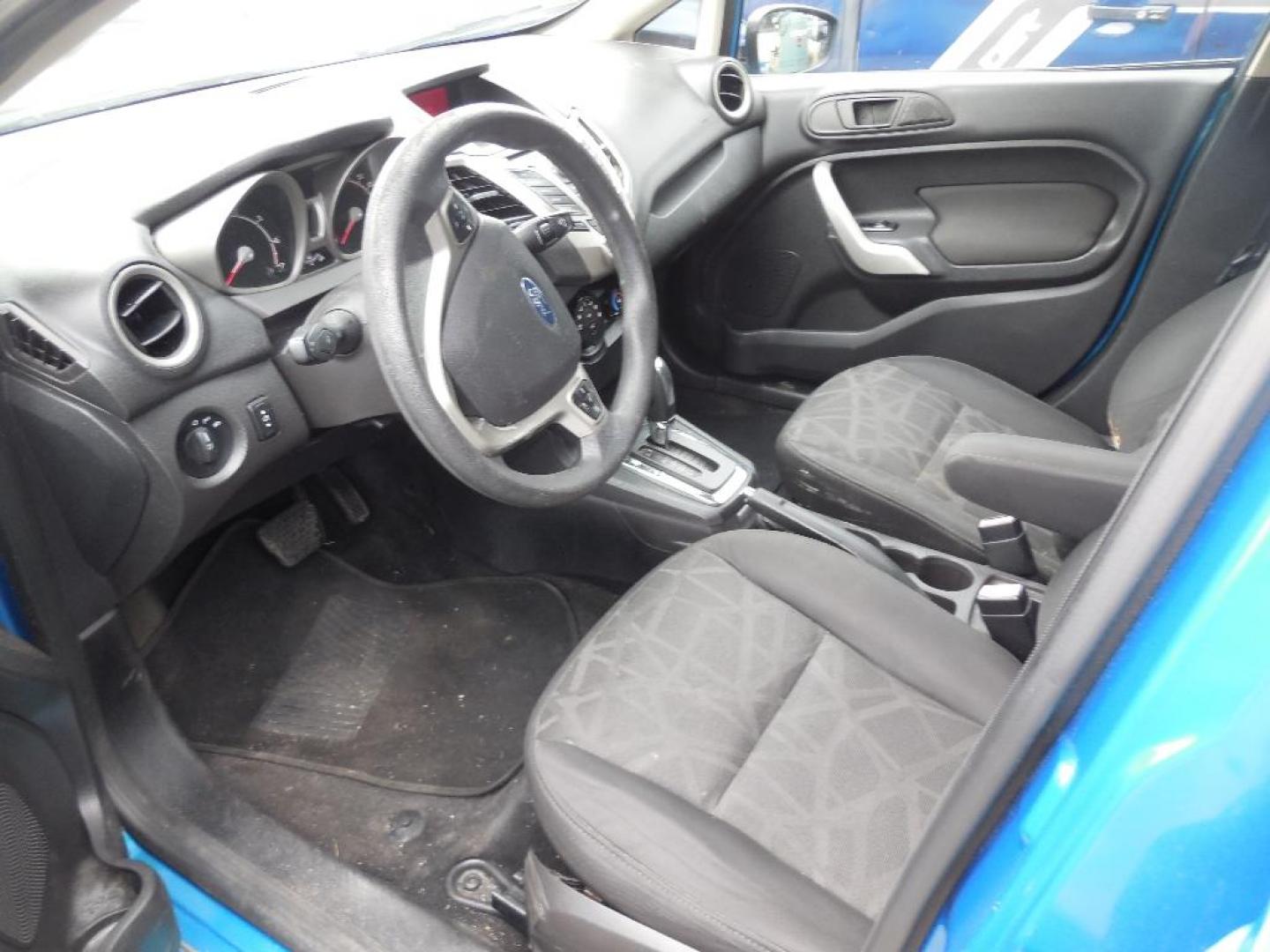 2012 BLUE FORD FIESTA SE Sedan (3FADP4BJ7CM) with an 1.6L L4 DOHC 16V engine, AUTOMATIC transmission, located at 2303 West Mt. Houston, Houston, 77038, (281) 507-3956, 29.771597, -95.339569 - Photo#3