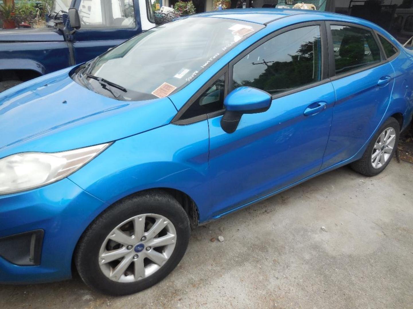 2012 BLUE FORD FIESTA SE Sedan (3FADP4BJ7CM) with an 1.6L L4 DOHC 16V engine, AUTOMATIC transmission, located at 2303 West Mt. Houston, Houston, 77038, (281) 507-3956, 29.771597, -95.339569 - Photo#5