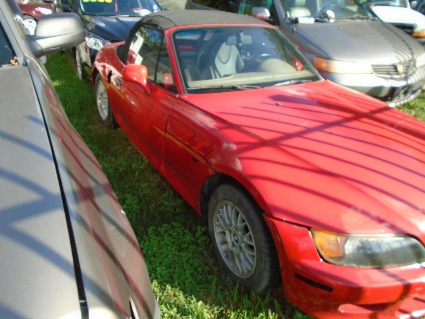 1998 RED BMW Z3 1.9 (4USCH7328WL) with an 1.9L L4 DOHC 16V engine, AUTOMATIC transmission, located at 2303 West Mt. Houston, Houston, 77038, (281) 507-3956, 29.771597, -95.339569 - Photo#0