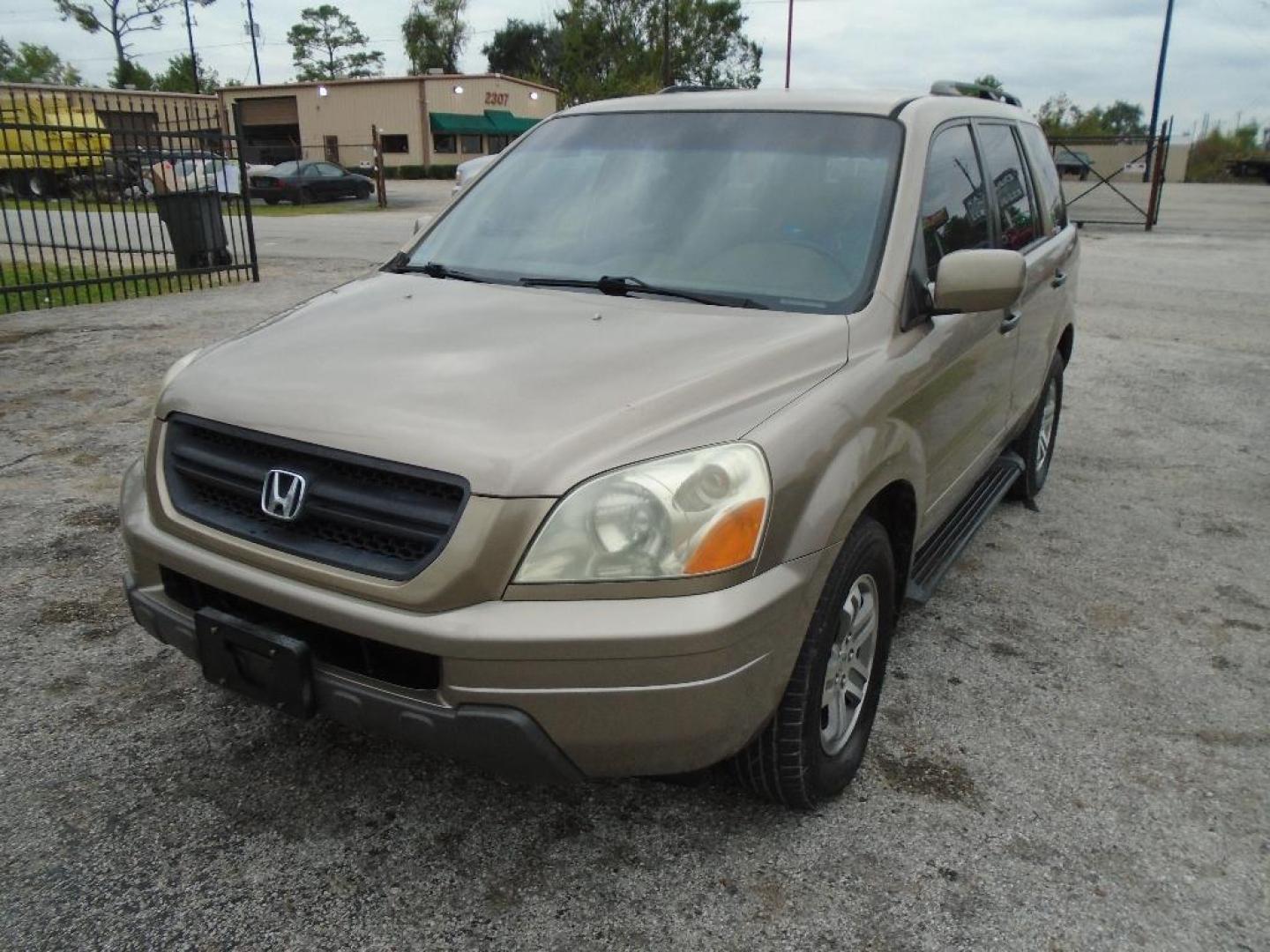 2003 BROWN HONDA PILOT EX w/ Leather and DVD (2HKYF18693H) with an 3.5L V6 SOHC 24V engine, AUTOMATIC transmission, located at 2303 West Mt. Houston, Houston, Texas, 77038, (281) 507-3956, 29.771597, -95.339569 - Photo#1