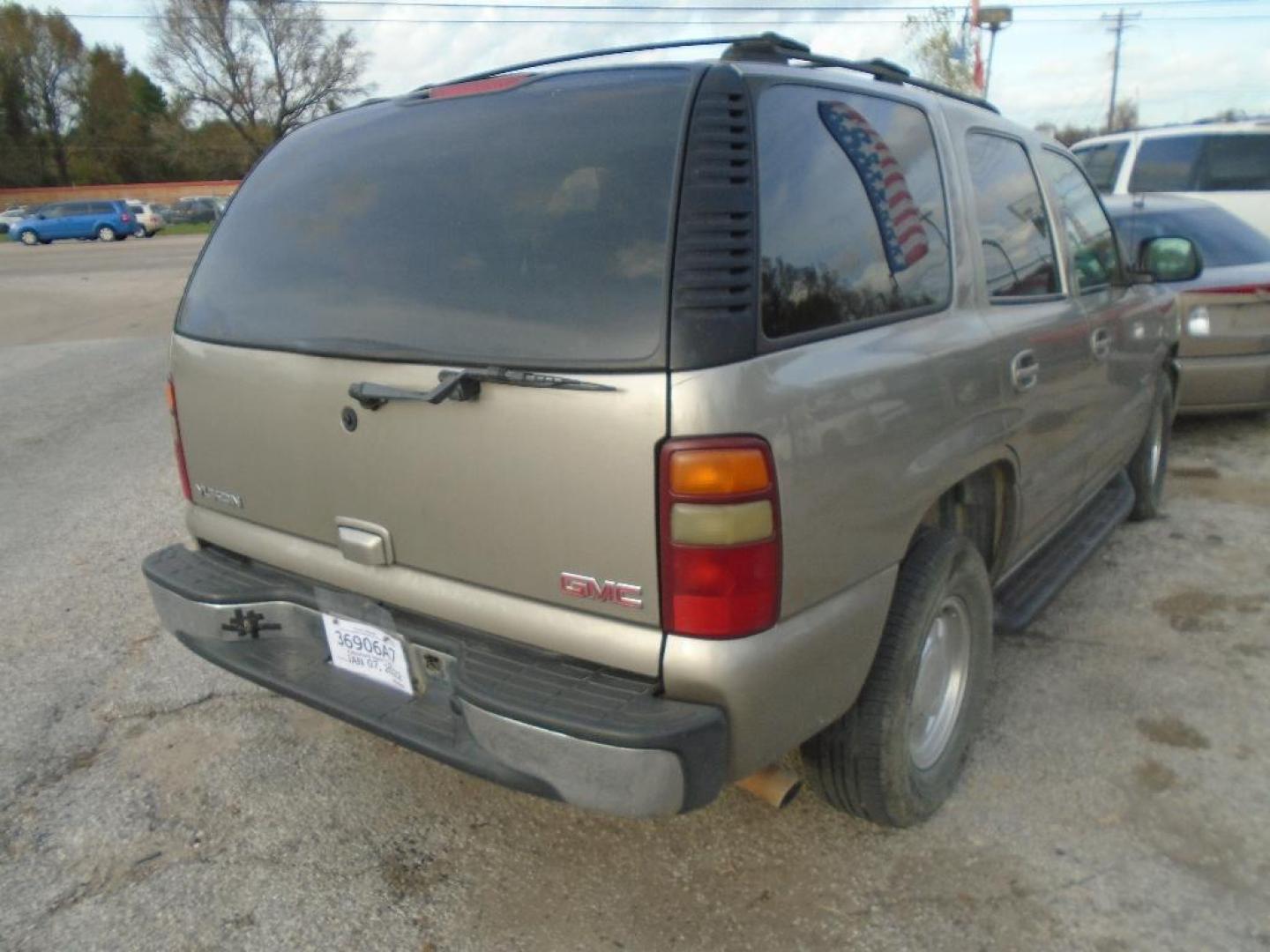 2003 TAN GMC YUKON 2WD (1GKEC13Z03J) with an 5.3L V8 OHV 16V FFV engine, AUTOMATIC transmission, located at 2303 West Mt. Houston, Houston, 77038, (281) 507-3956, 29.771597, -95.339569 - Photo#4