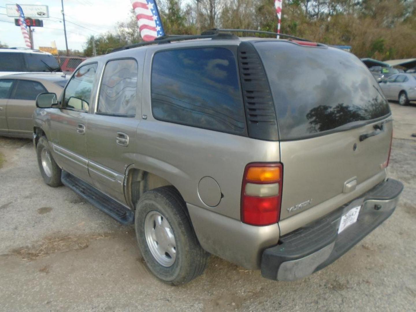 2003 TAN GMC YUKON 2WD (1GKEC13Z03J) with an 5.3L V8 OHV 16V FFV engine, AUTOMATIC transmission, located at 2303 West Mt. Houston, Houston, 77038, (281) 507-3956, 29.771597, -95.339569 - Photo#8